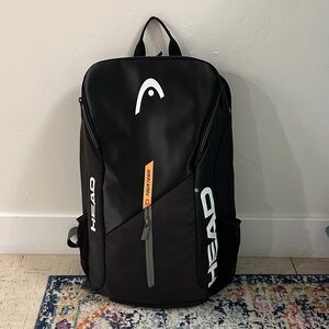 HEAD tennis Backpack in Black with Orange Accents